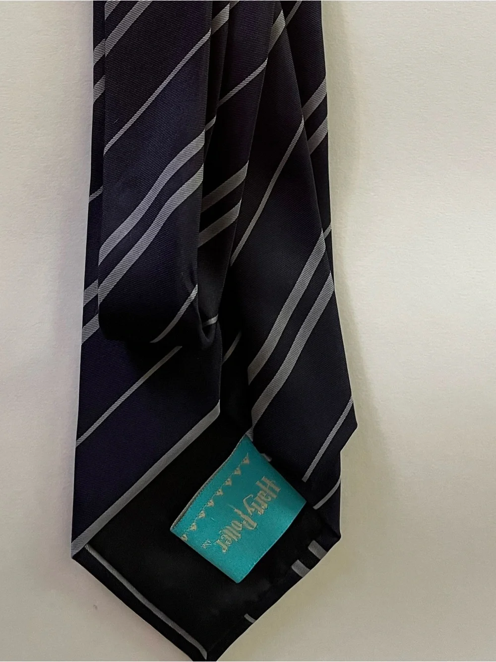 Harry Potter Ravenclaw Crest Diagonal Stripe Tie - Black & Gray with Blue Accent